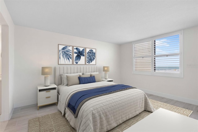 bedroom with light hardwood / wood-style floors