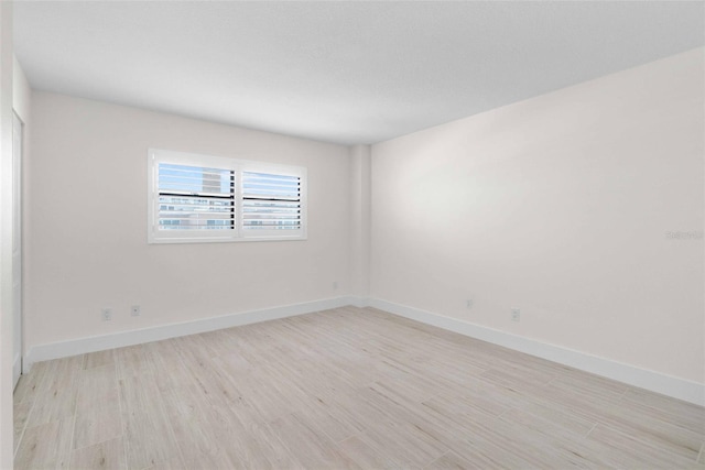 empty room featuring light hardwood / wood-style floors