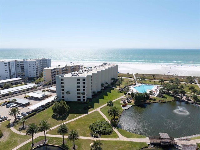 aerial view featuring a water view and a view of the beach