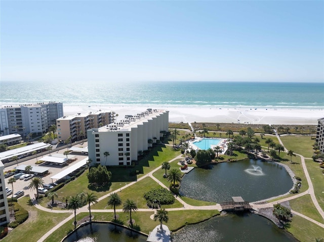 aerial view featuring a view of the beach and a water view