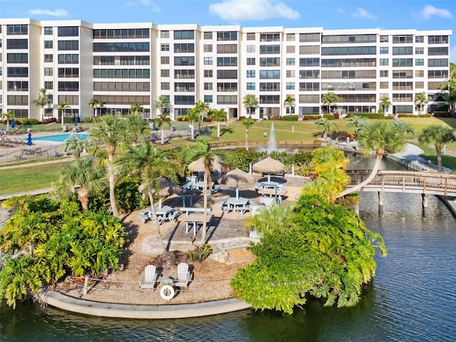 birds eye view of property featuring a water view