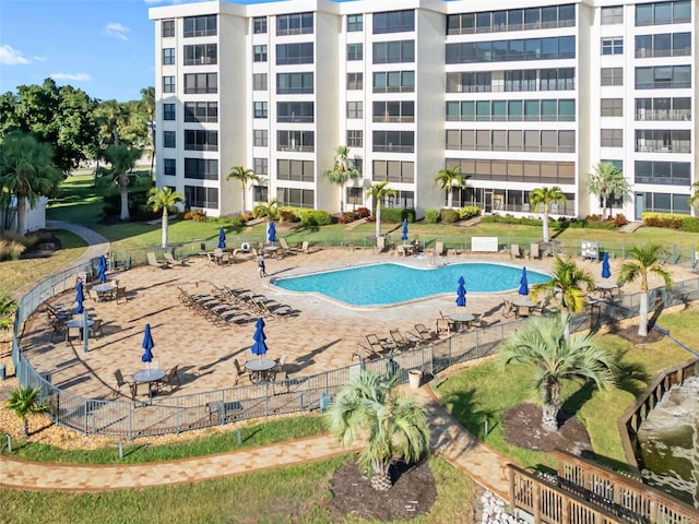 view of swimming pool featuring a patio area