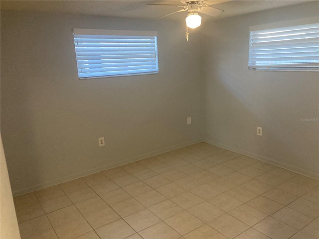 empty room featuring ceiling fan