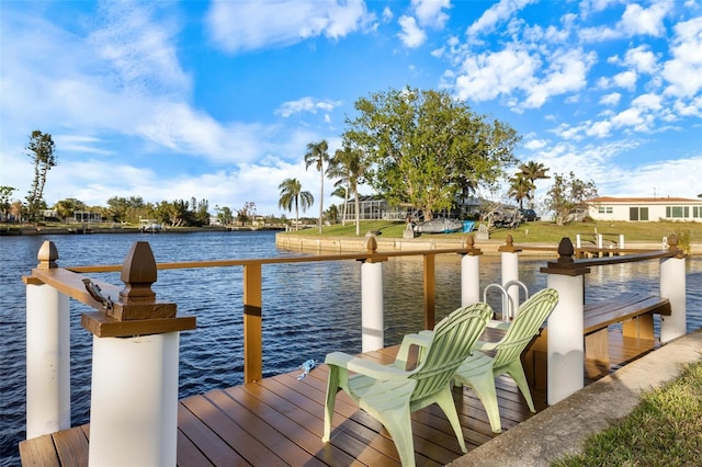 view of dock with a water view