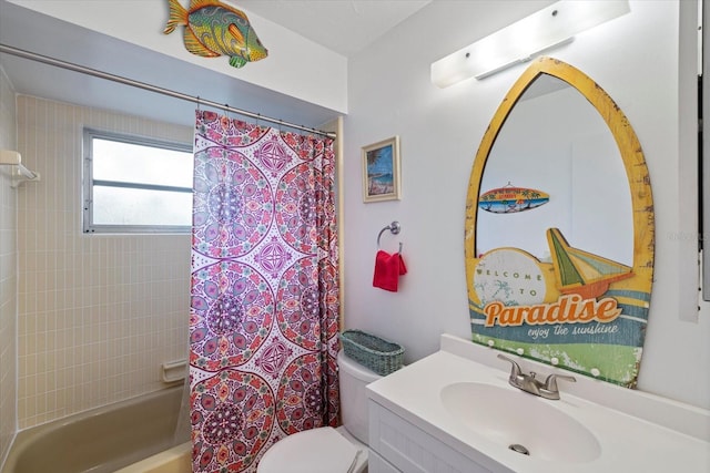 full bathroom featuring shower / tub combo with curtain, vanity, and toilet