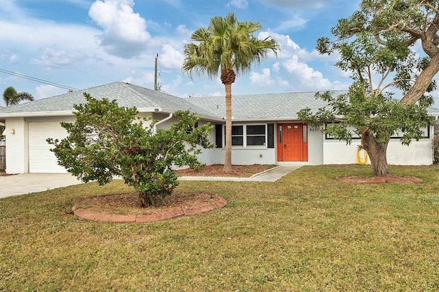 single story home with a front lawn and a garage