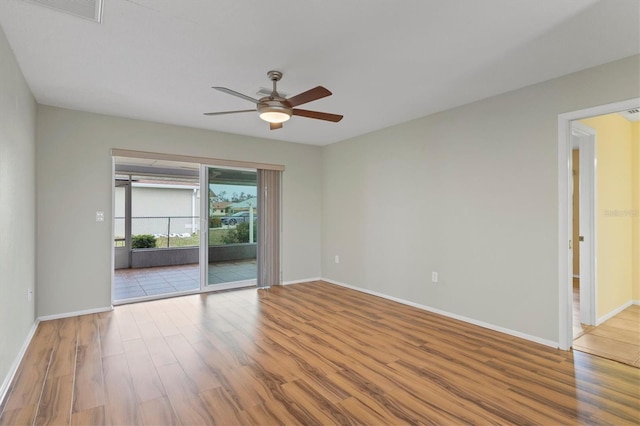 unfurnished room featuring ceiling fan and light hardwood / wood-style flooring