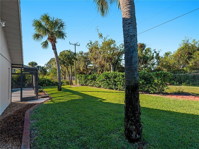 view of yard with fence