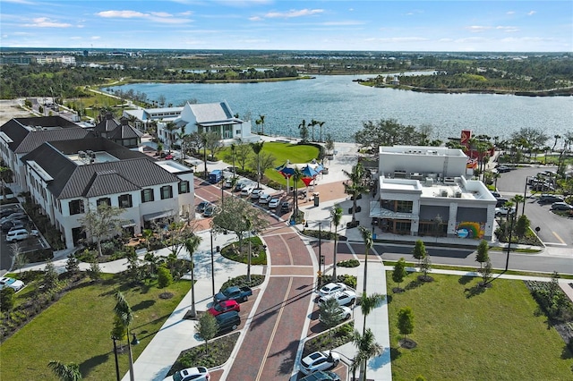 drone / aerial view with a water view