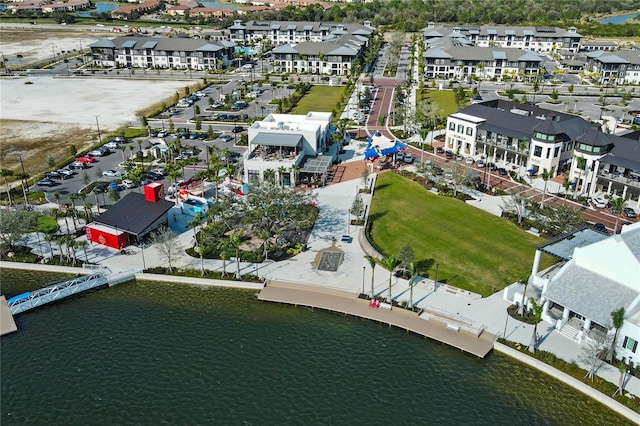 aerial view featuring a water view and a residential view