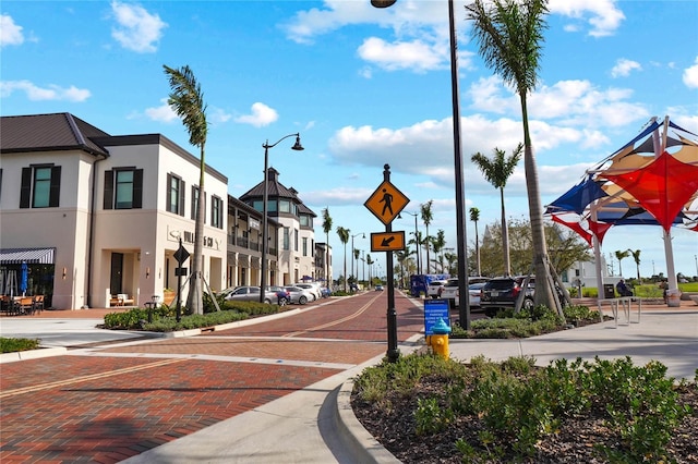 1678 Quail Lake Dr, Venice, FL 34293 - view of decorative street with traffic signs, street lights, curbs, and a residential view