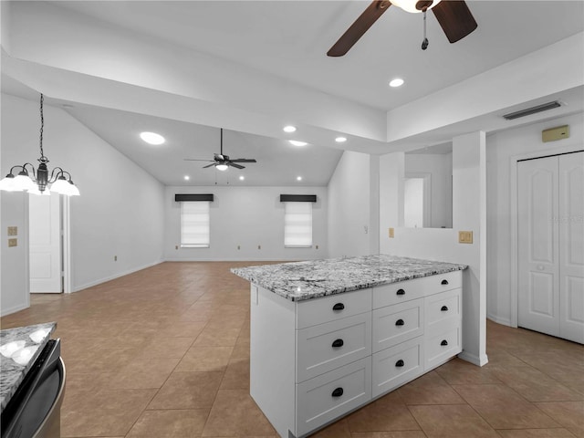 1678 Quail Lake Dr, Venice, FL 34293 - kitchen featuring ceiling fan, white cabinetry, light tile patterned floors, lofted ceiling, and recessed lighting
