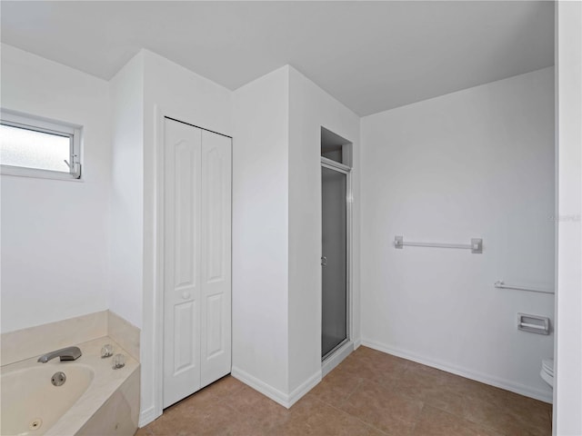 1678 Quail Lake Dr, Venice, FL 34293 - bathroom featuring a closet, a jetted tub, a shower stall, and toilet