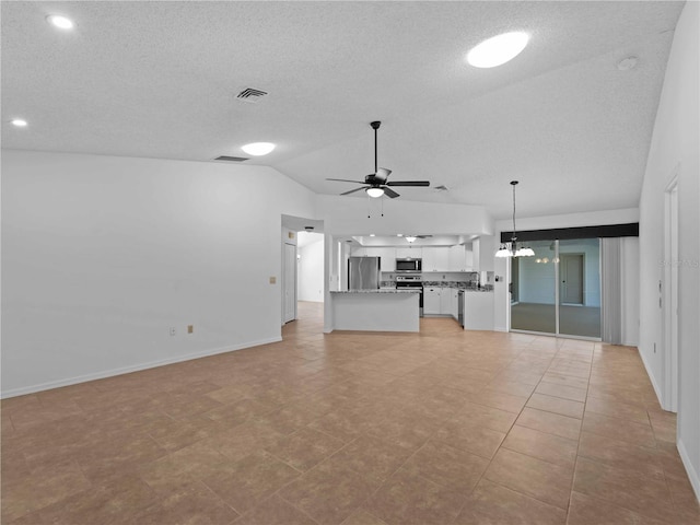 1678 Quail Lake Dr, Venice, FL 34293 - unfurnished living room featuring ceiling fan, vaulted ceiling, baseboards, a textured ceiling, and recessed lighting