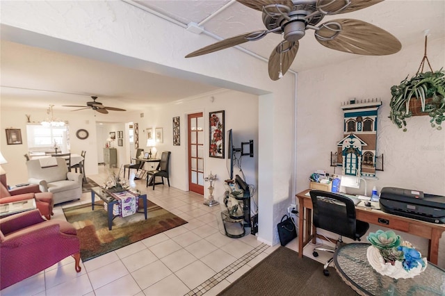 living room featuring ceiling fan and light tile patterned floors