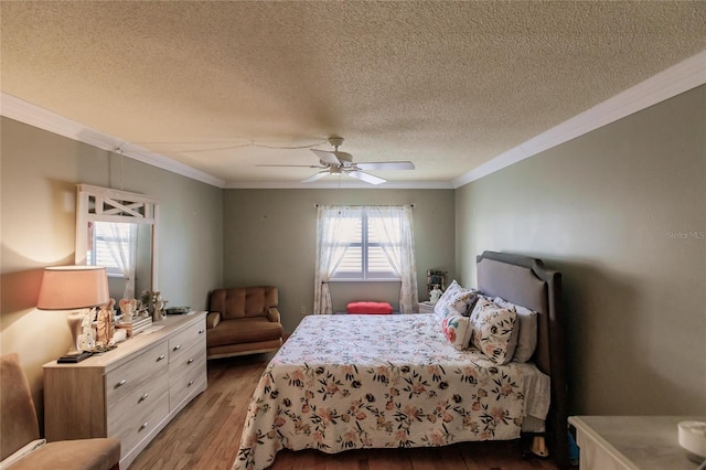 bedroom featuring multiple windows, a textured ceiling, ceiling fan, and crown molding