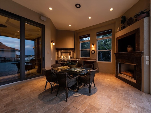 dining area with a large fireplace