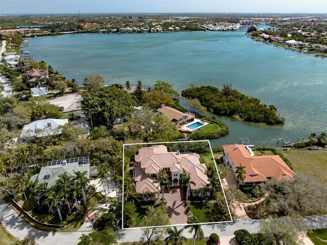 bird's eye view with a water view