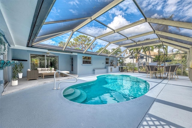 view of swimming pool with an outdoor living space, glass enclosure, and a patio area