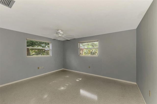 unfurnished room featuring ceiling fan