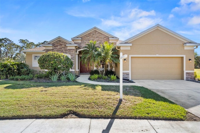 view of front of home with a garage and a front lawn