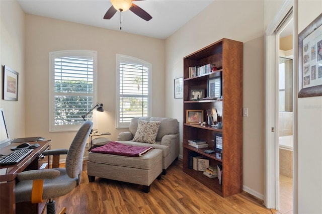 office featuring hardwood / wood-style floors and ceiling fan