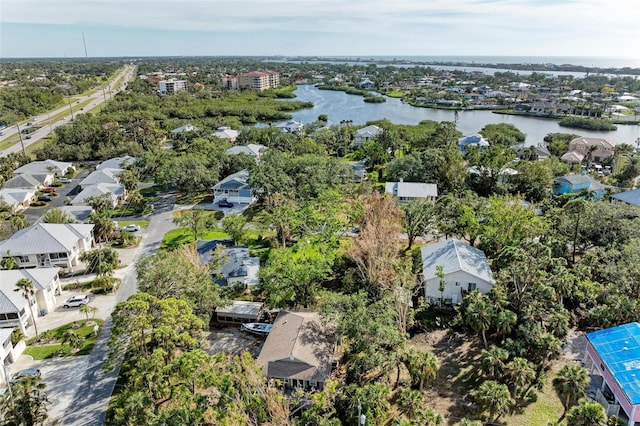 bird's eye view with a water view