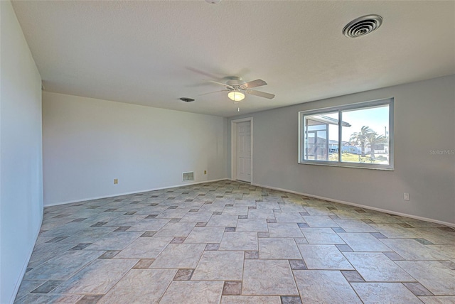 spare room featuring ceiling fan