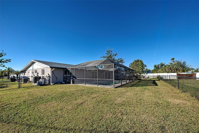 view of yard with a lanai