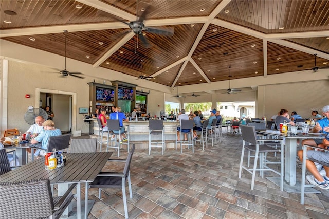 view of patio featuring a gazebo and exterior bar