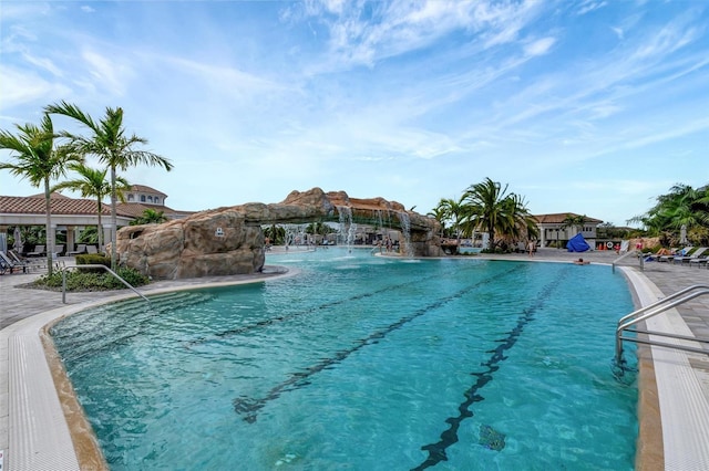 view of pool featuring pool water feature