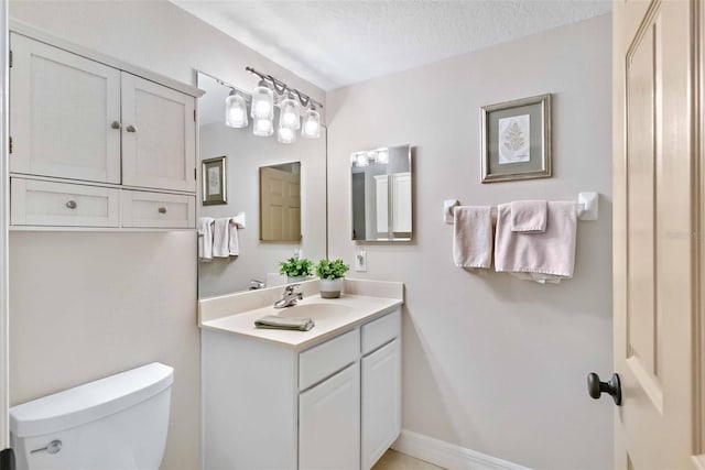 9607 Sea Turtle Ter Unit 101, Bradenton, FL 34212 - bathroom featuring vanity and a textured ceiling