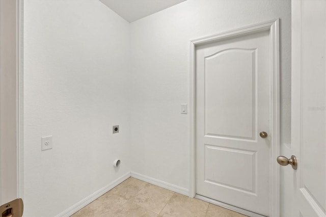 laundry room with light tile patterned flooring and hookup for an electric dryer