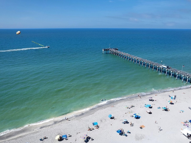 aerial view with a view of the beach and a water view