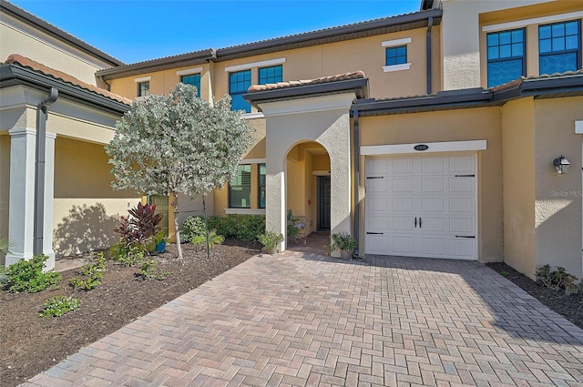 view of front of property featuring a garage