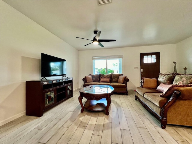 living room with ceiling fan and light hardwood / wood-style floors