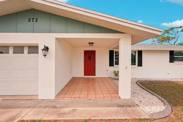 property entrance featuring a garage