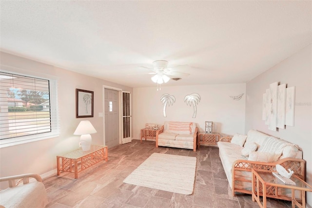 living room with ceiling fan