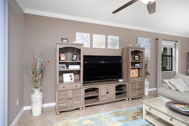 tiled living room with ceiling fan and crown molding