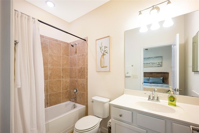 full bathroom featuring shower / bath combo, vanity, and toilet