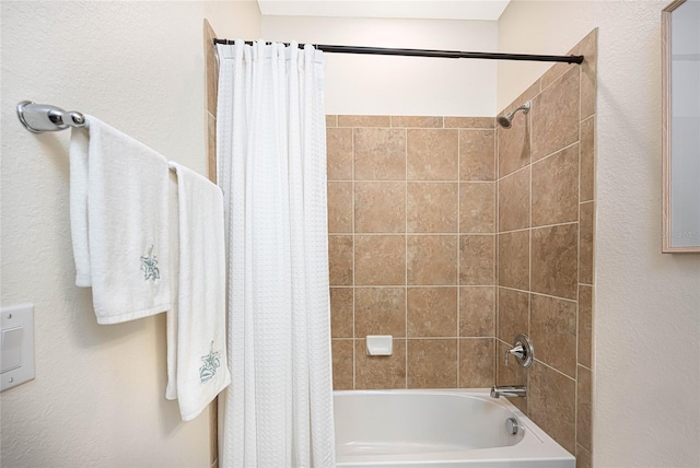 bathroom with shower / tub combo