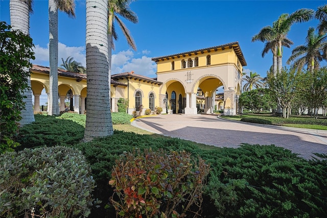 rear view of property with a balcony