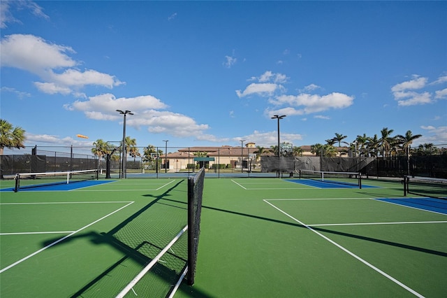 view of tennis court with basketball court