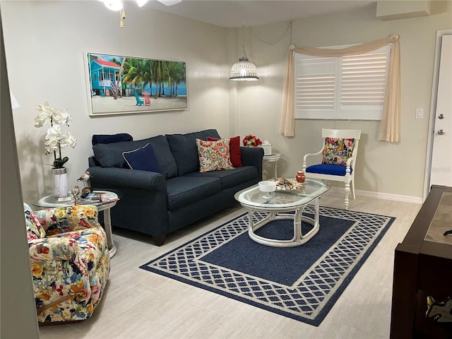 living room with ceiling fan