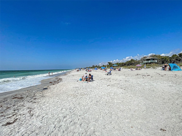 property view of water featuring a view of the beach