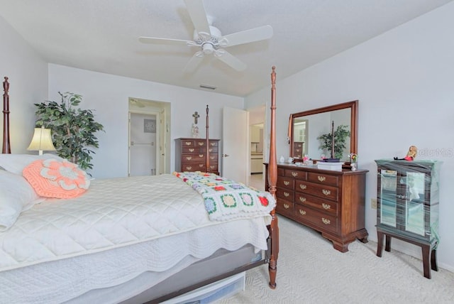 bedroom featuring ceiling fan and light colored carpet