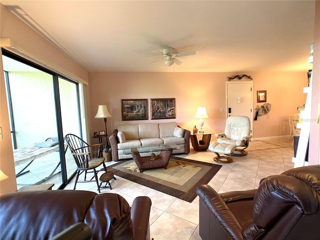 living room featuring ceiling fan and light tile patterned flooring