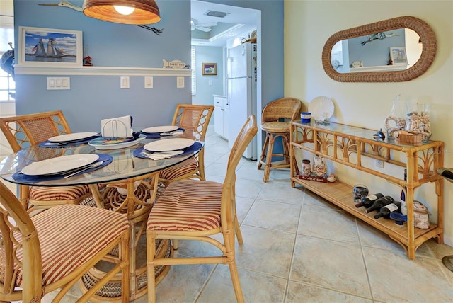 dining room with light tile patterned flooring