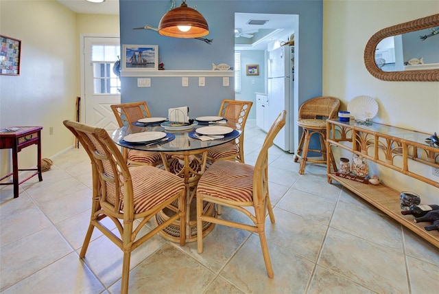 dining space with light tile patterned flooring