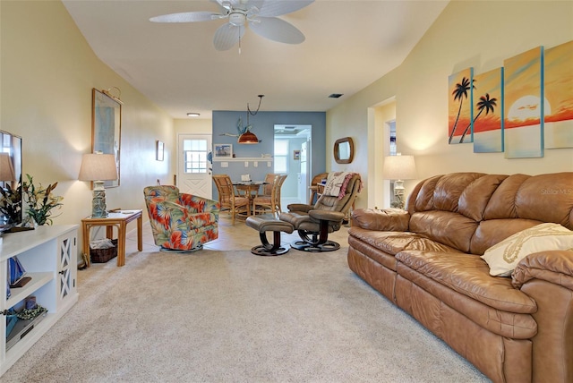 living room with ceiling fan and light carpet